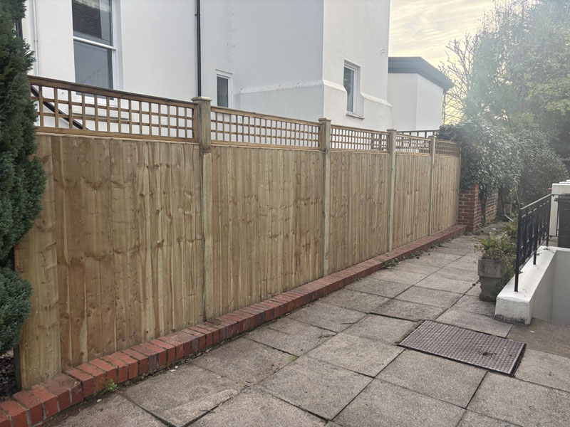Closeboard panels topped with 60mm Polish square trellis.
